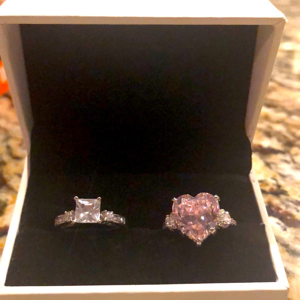 1.3ct white sapphire,14ct white gold 1/4 diamond.
